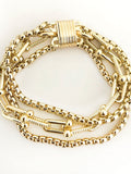 Gold three-row layered chain bracelet with magnetic clasp