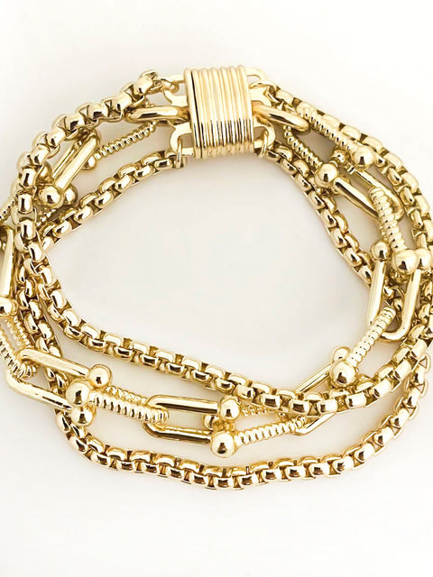Gold three-row layered chain bracelet with magnetic clasp